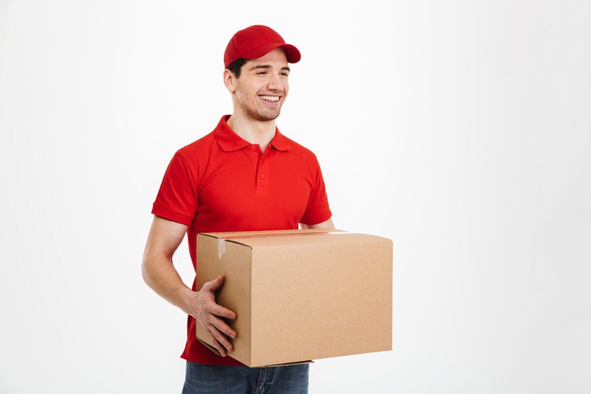 handsome young delivery man with parcel post box